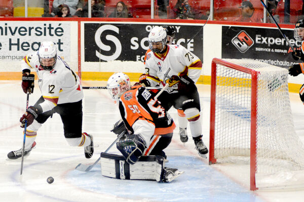 GALLERY: Hearst outlasts Timmins in OT